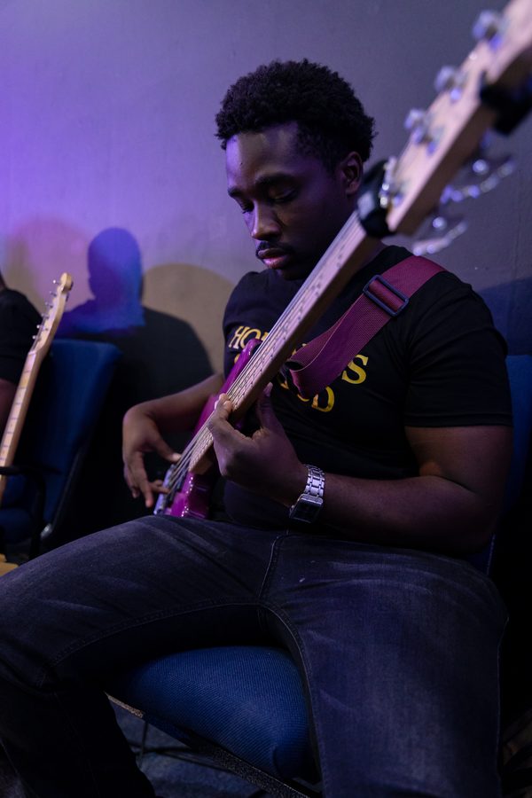 Bassist playing during worship