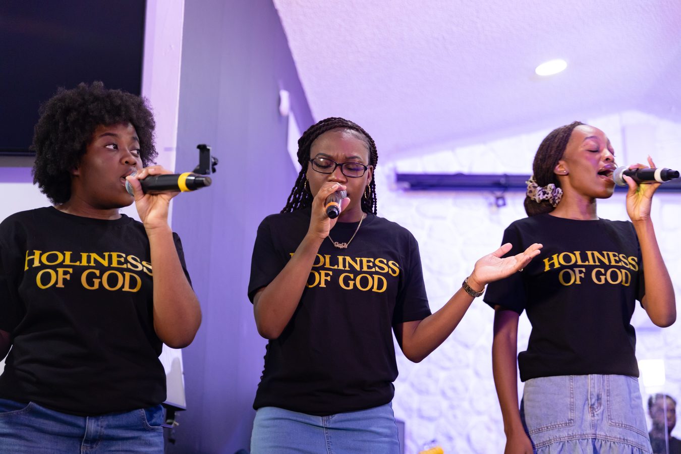 Trio of vocalists performing